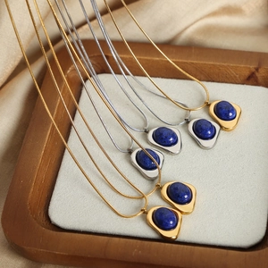 Vintage irregular geometric gold-plated necklace with oval blue natural stone pendant