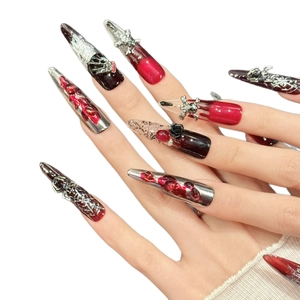 Gothic press-on nails with red blood drips, black roses and silver cross accents