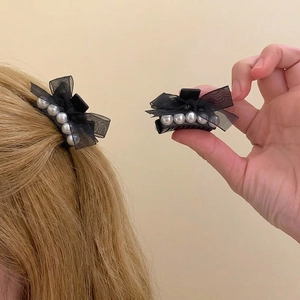 Elegant black tulle bow hair claw clip with white pearls for women's hair styling