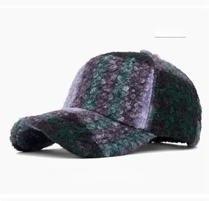 Close-up of thick textured purple and green lamb wool baseball cap fabric and crown