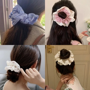 Collage of four large lace scrunchies in blue stripes, pink plaid, and floral patterns