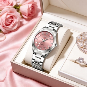 Detailed macro view of DEDIMA silver watch with pink dial in a luxury jewelry box