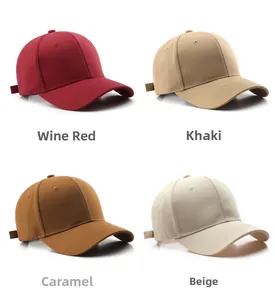 Detailed view of plain baseball caps in burgundy, khaki, caramel and beige colors