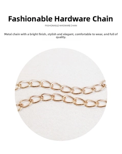 Close-up of a polished light gold chain strap with flat oval links for shell handbags