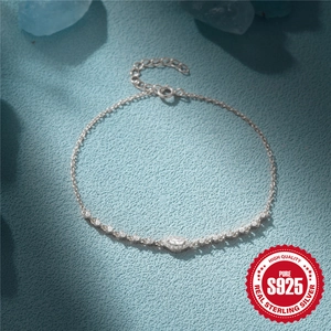 Elegant 925 sterling silver tennis bracelet with marquise-cut zircon eye and tiny diamonds