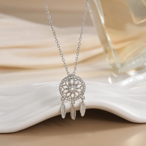 Silver dreamcatcher pendant necklace with pavé zircon feathers and elegant mesh chain