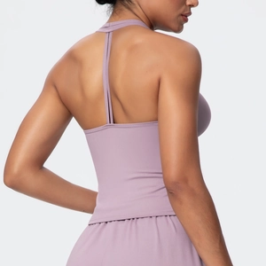 Detail view of lavender racerback sports bra with T-shaped strap design for yoga
