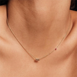 Titanium steel angel number 666 necklace with gold chain and red gemstone accent