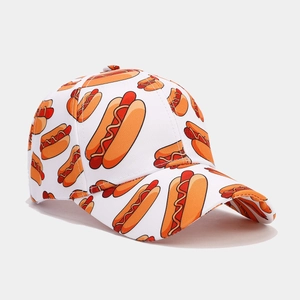 Close-up of hot dog pattern print and premium stitching on white cotton baseball cap