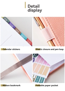Detail view of pink leather planner with functional pen loop, stickers and ribbon bookmark
