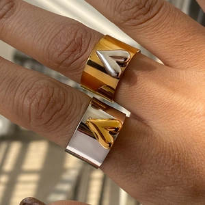 Polished titanium steel wide rings in gold and silver with 3D heart-shaped decor