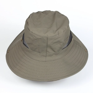 Detail of khaki outdoor sun hat featuring breathable black mesh and durable metal side snaps