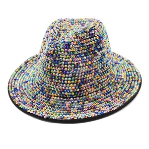 Detailed close-up of a premium wool fedora hat covered in sparkling iridescent AB rhinestones