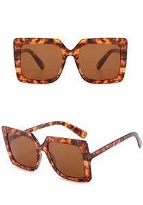 Front and side views of square oversized tortoiseshell sunglasses with brown lenses