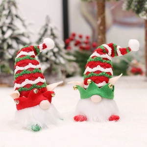 LED Christmas Gnomes with stripe knit hats and bells in a festive snow scene decor