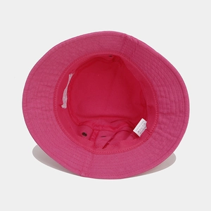 Pink cotton bucket hat interior view with metal eyelets and premium embroidery detail