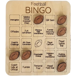 Macro detail of laser-engraved wooden football bingo board and ball-shaped game markers