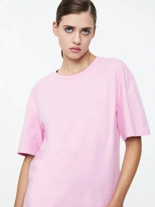 T-shirt rosa in cotone girocollo stile vintage lavato per una vestibilità estiva ampia