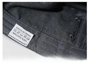 Detailed close-up of 100% cotton inner band with wide sweatband and dual stitching