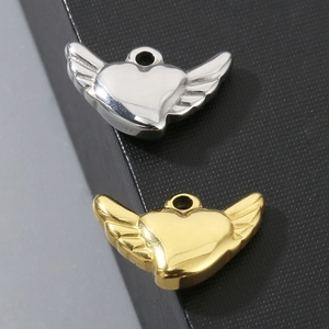 Polished stainless steel heart pendants with angel wings in gold and silver finishes