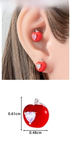 Detailed view showing the small 0.61cm red apple stud earring with heart-shaped zircon