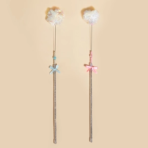 Detail showing fairy cat teaser wand with silk bow, plastic beads and heart ball