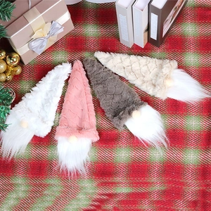 Set of 4 Christmas gnome wine bottle covers in white, pink, grey and beige knit