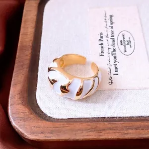 Irregular textured gold ring with white enamel, luxury open adjustable design for women