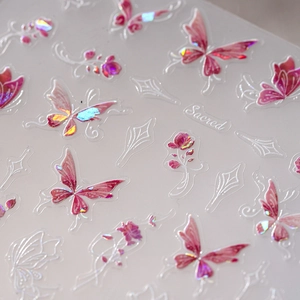 3D laser gold butterfly nail stickers with holographic floral designs and metallic shine