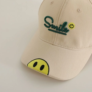 Kids cotton baseball cap with Smile embroidery and yellow smiley face on brim