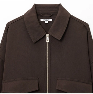 Front view of a dark brown casual zip-up jacket with pockets and high-quality woven fabric