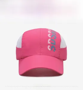 Detail of pink sports cap with white breathable mesh side panels and stylish crown print