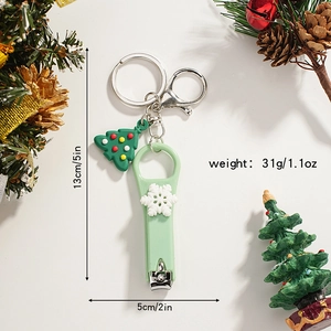 Detailed size view of Santa Christmas nail clipper keychain with dimensions and weight info
