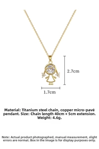 Detail of titanium steel gold chain and girl pendant with sparkling white diamonds
