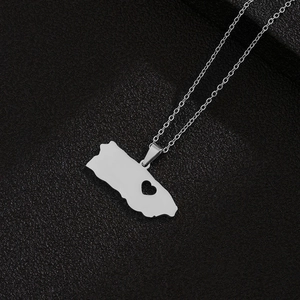 Silver Puerto Rico map pendant necklace with heart cutout in polished stainless steel