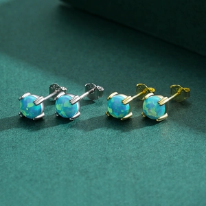 S925 sterling silver opal stud earrings set in silver and gold with four-prong settings