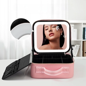 Detail view of pink PU leather makeup bag with 4K LED mirror and adjustable dividers