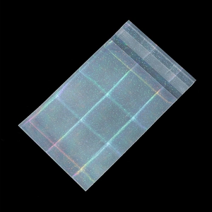Macro view of laser holographic self-sealing bag showing iridescent glitter effect