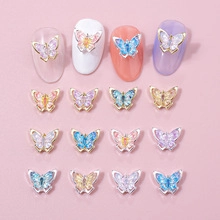 3D hollow butterfly nail charms in various colors with gold and silver metal frames