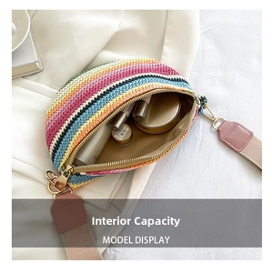 Detail of bohemian rainbow woven waist bag showing internal capacity and pink wide strap