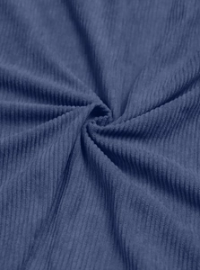 Close-up of blue corduroy fabric texture with vertical ribs on a casual men hoodie