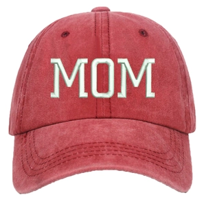 Detailed close-up of light beige MOM 3D embroidery on a washed red cotton baseball cap