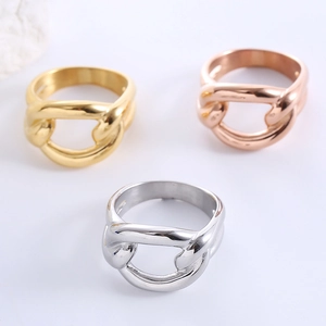 Modern hollow knot rings in gold, silver and rose gold finishes made of stainless steel