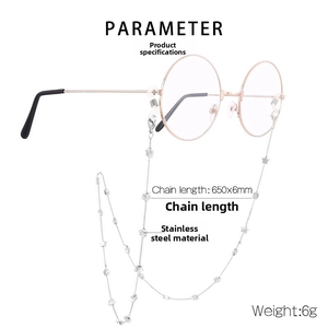 Macro shot of silver stainless steel eyewear chain with star charms and chain length specs