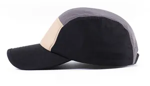 Side view of five-panel quick-dry baseball cap in black, grey, and beige patchwork