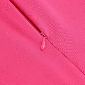 Detailed macro view of the rose red dress featuring a seamless invisible zipper closure
