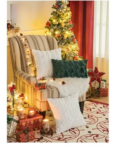 Detailed plush Christmas pillow featuring 3D embroidered trees and snowflakes decoration