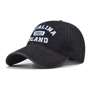 Detailed close-up of 1983 vintage washed denim baseball cap with premium 3D embroidery