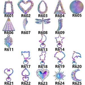 Detailed view of rainbow electroplated alloy charms in heart and animal shapes