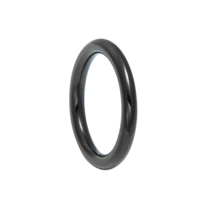 Macro view of polished black stainless steel ring with a smooth mirror finish